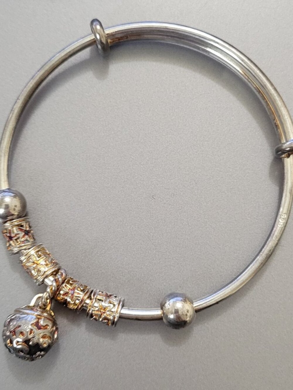 Silver Bangle with Gold Accents and Ball Dangle Bracelet